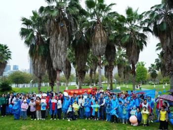 旅游与商贸学院学子参与“牵着蜗牛去散步”志愿服务  用爱守护特殊群体 